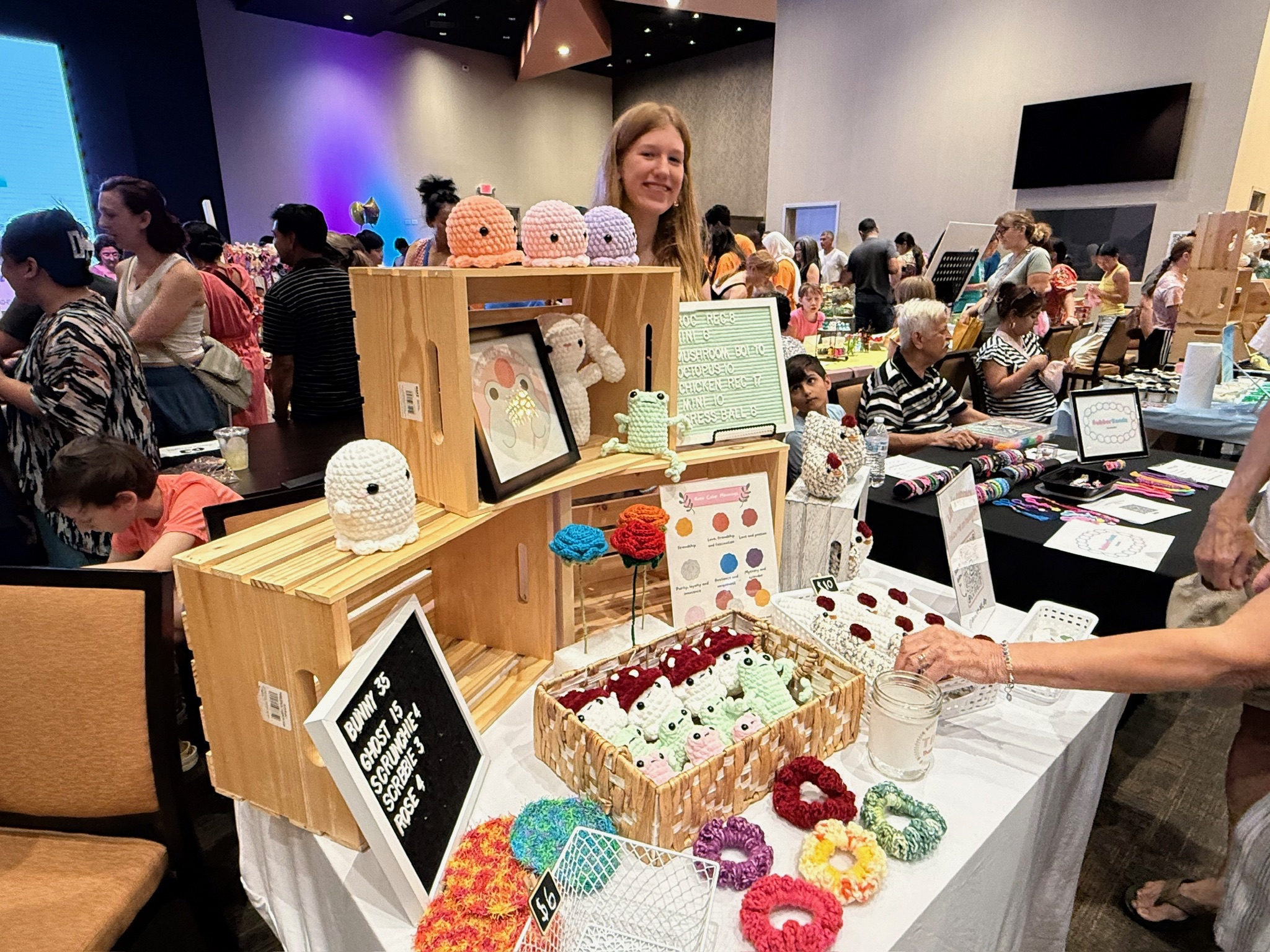 Kidpreneurs sharing products with visitors