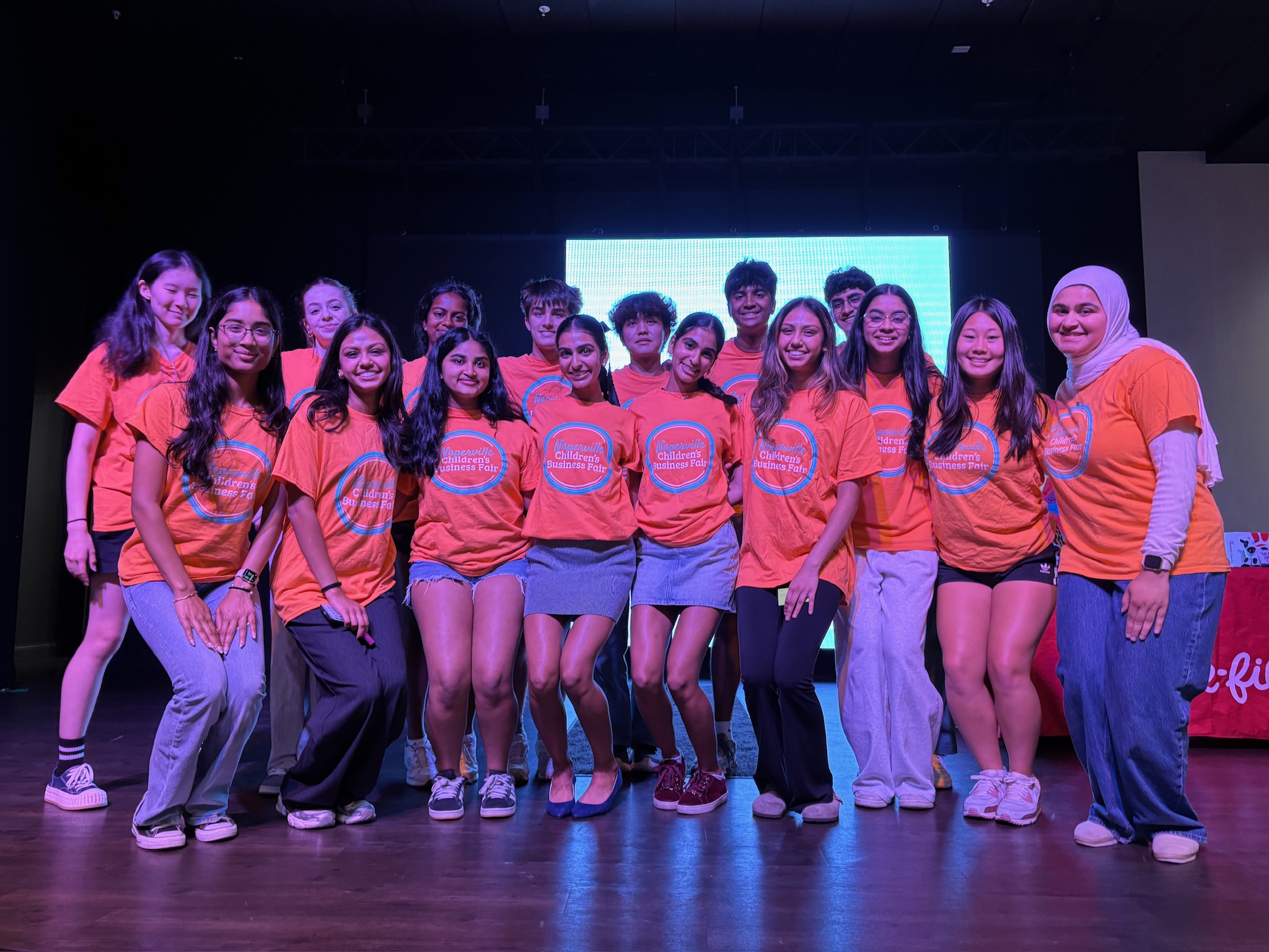 Families and students enjoying the fair